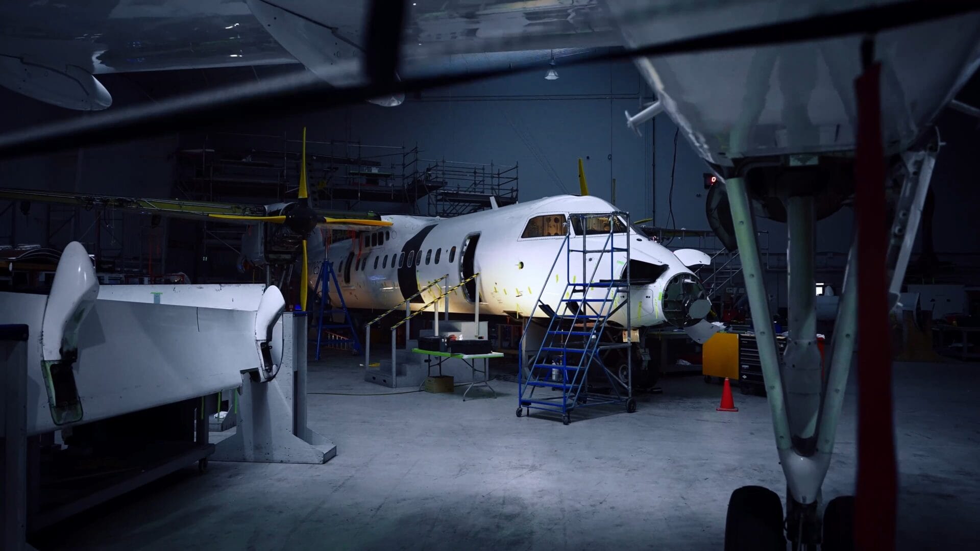 Dash 8 aircraft in hangar undergoing MRO