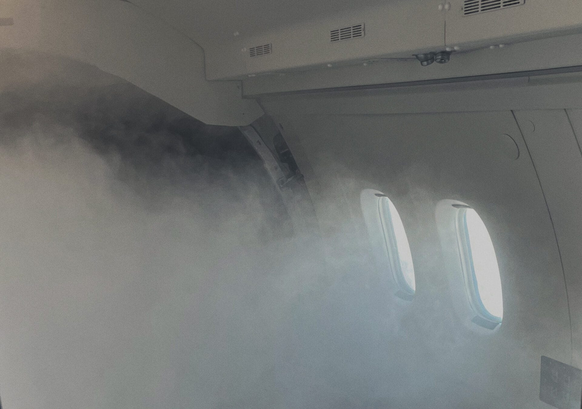cabin of aircraft full of smoke