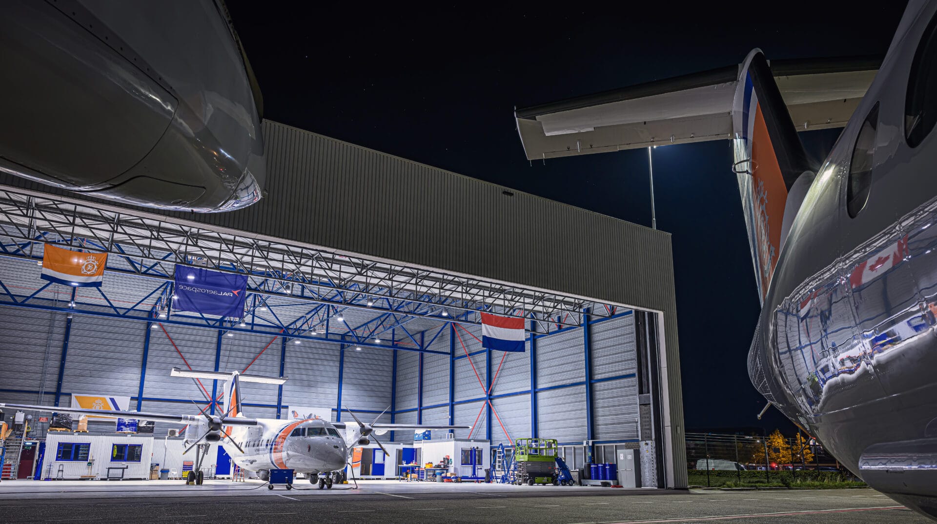 picture of netherlands coast guard hangar housing pal aerospace dash 8 maritime surveillance aircraft in Schiphol